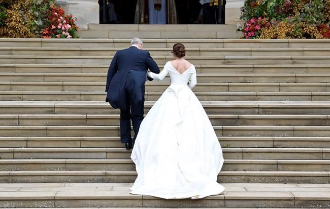 The Latest: British designers made Eugenie's wedding dress | iNFOnews.ca The Latest: British designers made Eugenie's wedding dress | iNFOnews.ca