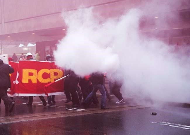 Anti-capitalists take to the streets in Montreal to denounce 'scheming' rich | iNFOnews.ca CP2050590558