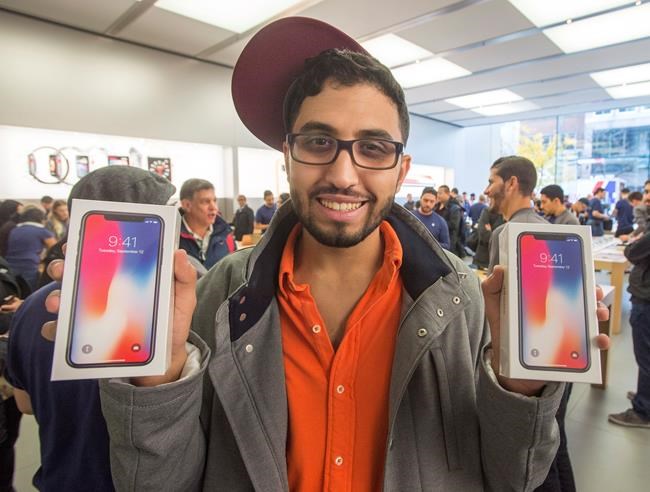 Apple's ultra-expensive iPhone X draws crowds as in-store sales begin | iNFOnews.ca