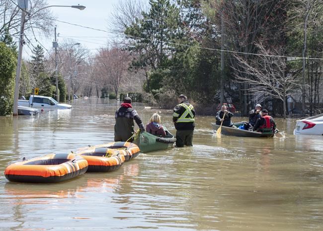 Vignettes from a Quebec flood zone, where burst dike forced mass evacuation | iNFOnews.ca