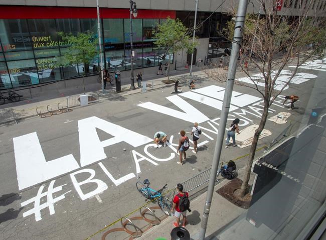 Bilingual 'Black Lives Matter' street message highlights Montreal artists | iNFOnews.ca Bilingual 'Black Lives Matter' street message highlights Montreal artists | iNFOnews.ca