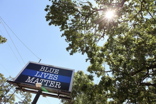 'Blue Lives Matter' sign put up near site of police shooting | iNFOnews.ca
