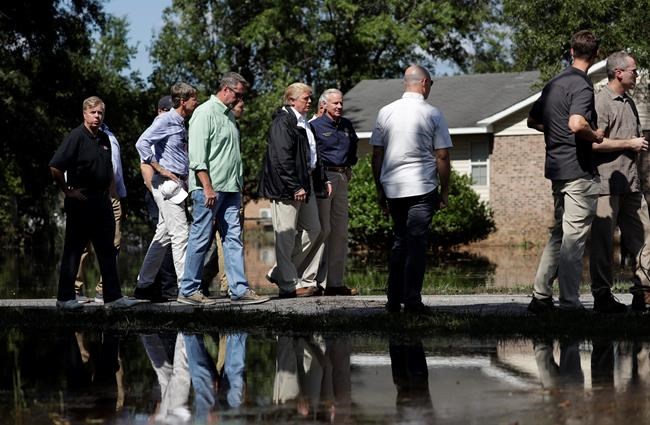 The Latest: Trump assures South Carolina as flooding lingers | iNFOnews.ca CP1146422009