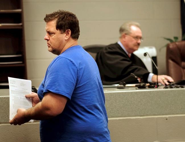 The Latest: Victim's wife: bike shop killer was angry patron | iNFOnews.ca