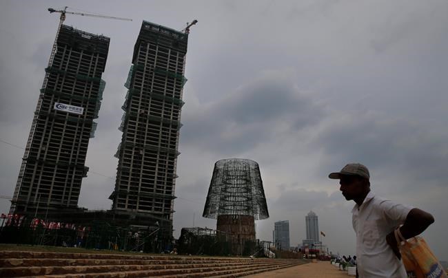 Sri Lankans rush to build towering Christmas tree on time | iNFOnews.ca Sri Lankans rush to build towering Christmas tree on time | iNFOnews.ca