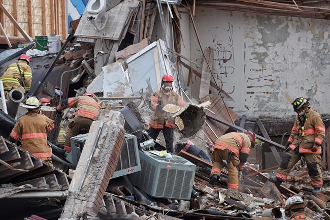 The Latest: Worker found dead in building collapse | iNFOnews.ca