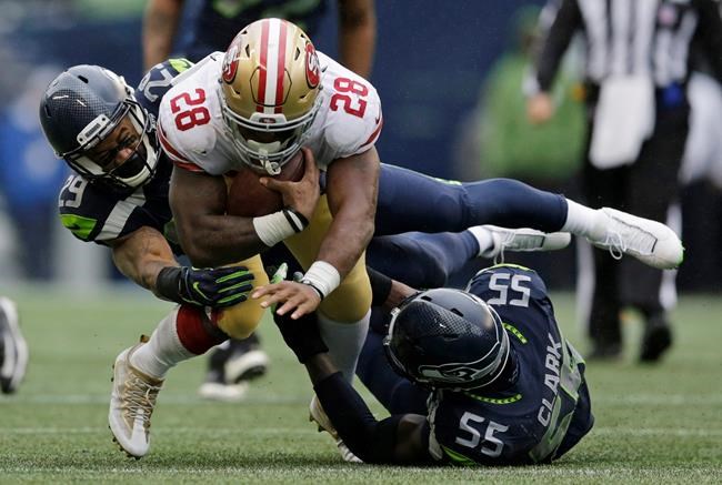 Wilson's escape act helps Seahawks top 49ers 12-9 | iNFOnews.ca CP700540272