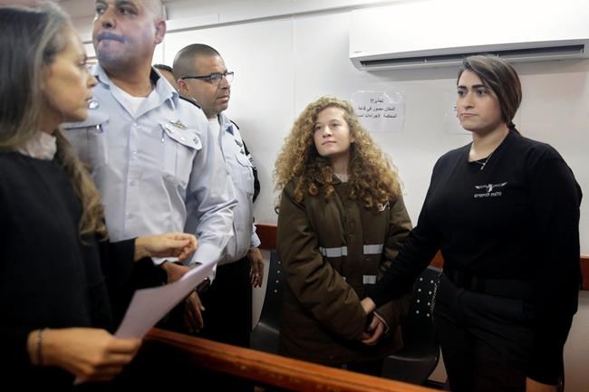 Palestinian teen to be held until trial for slapping troops | iNFOnews.ca Palestinian teen to be held until trial for slapping troops | iNFOnews.ca