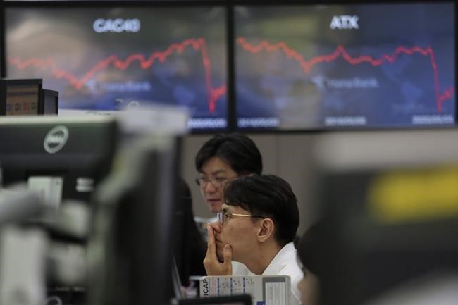 Asian stocks mixed after Wall Street gains on recovery hopes | iNFOnews.ca