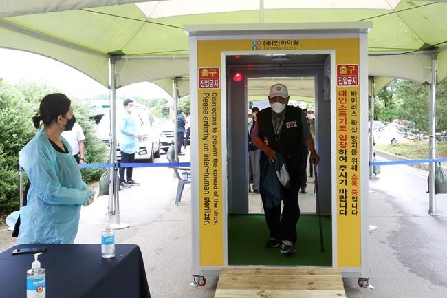 The Latest: Beijing says virus spike appears under control | iNFOnews.ca