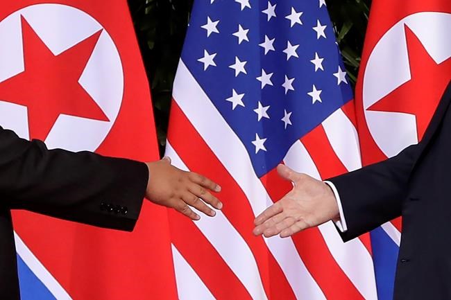 Trump and Kim shake hands in scene complex as their rivalry | iNFOnews.ca Trump and Kim shake hands in scene complex as their rivalry | iNFOnews.ca
