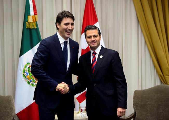 Trudeau talks trade with Mexican president ahead of meeting with Pence in Peru | iNFOnews.ca CP682148374