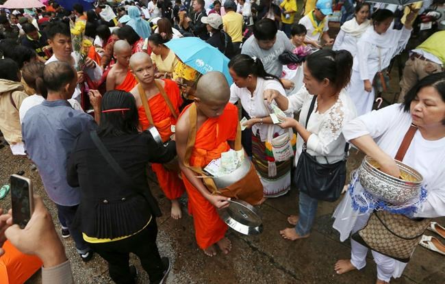 Boys rescued from Thai cave ordained at Buddhist temple | iNFOnews.ca CP1835818359