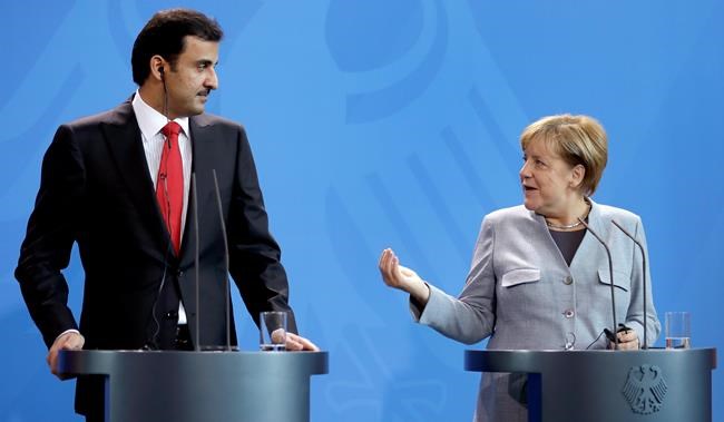 Qatari emir meets Merkel, Macron in 1st trip since crisis | iNFOnews.ca Qatari emir meets Merkel, Macron in 1st trip since crisis | iNFOnews.ca