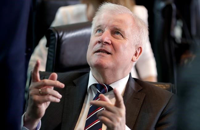 German interior minister says dispute with Merkel is history | iNFOnews.ca