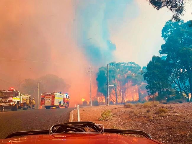 59 homes lost, more threatened in Australian wildfire | iNFOnews.ca CP895474422