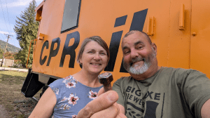 Dave and Karen Westhouse and with a geocache find.