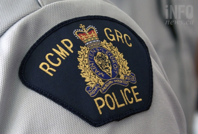 An RCMP badge on a shirt.
