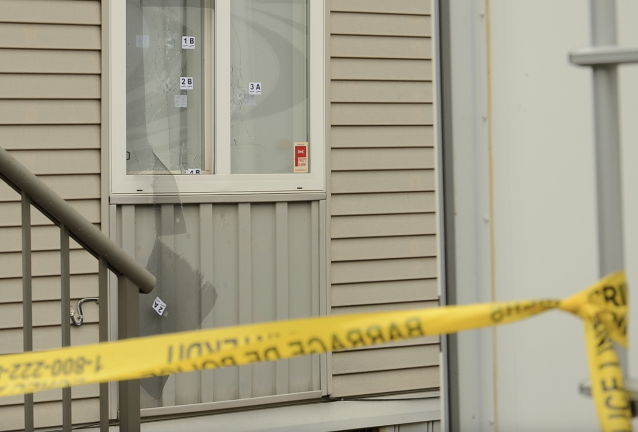 Bullet holes in a trailer at the Pleasant Valley Manufactured Home Community in Vernon.