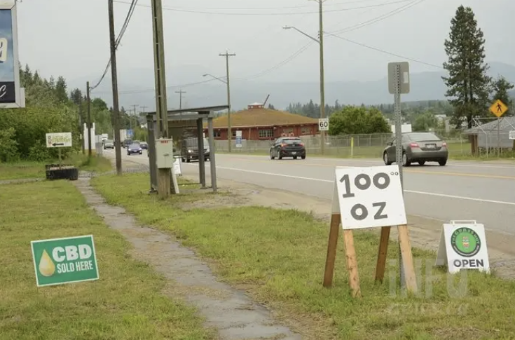 'It almost broke me:' For Okanagan, Kamloops cannabis retailers it's been a tough 7 years since legalization | iN420 A sign advertising cannabis for $100 an ounce, on the side of the highway in enderby.