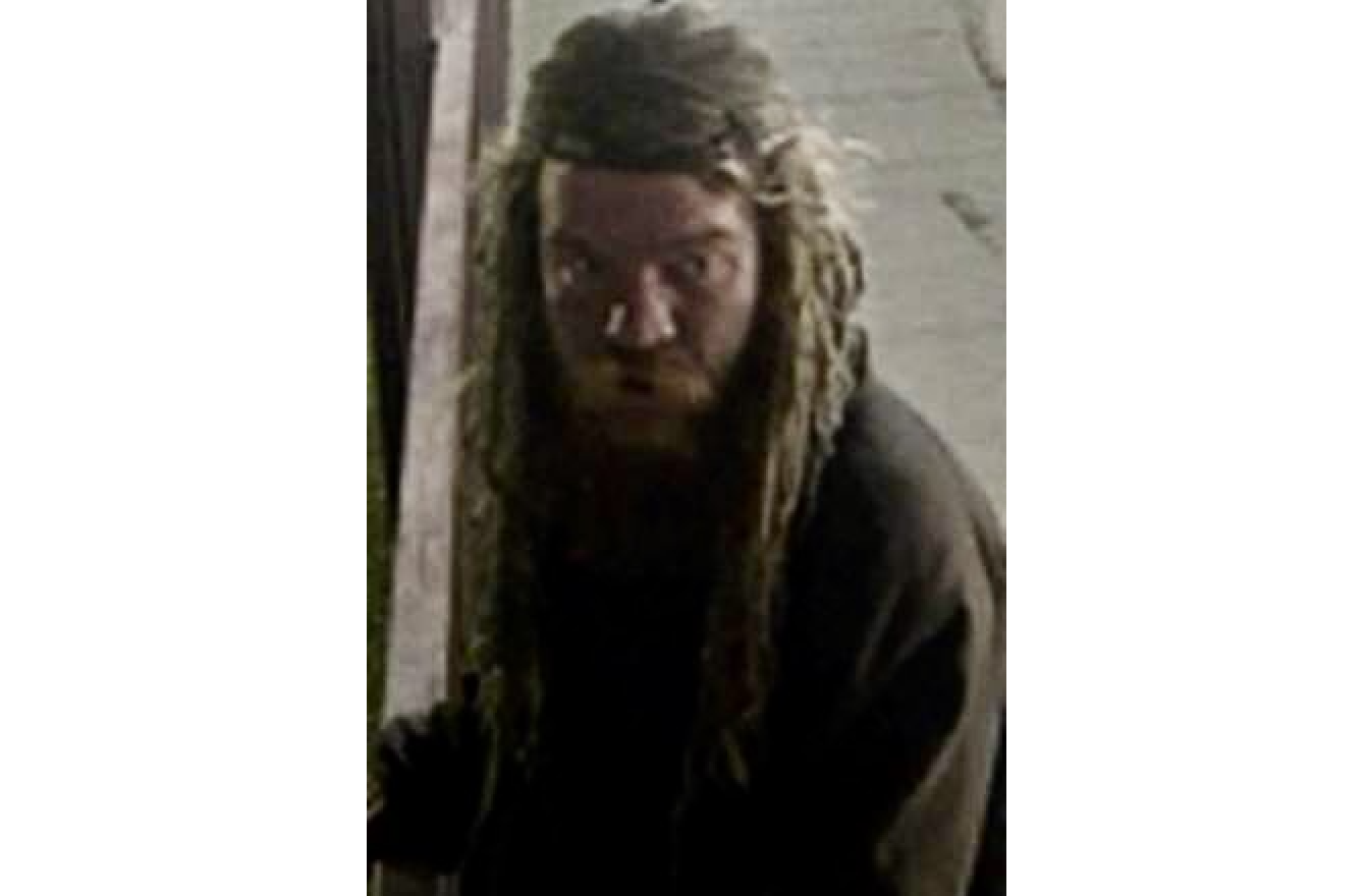 A man with long dreadlocks.