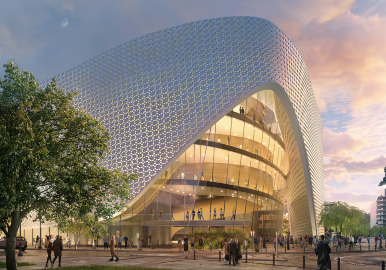 A futuristic building lit up on the inside.