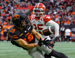 A football player making a catch.