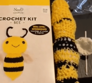 A horrifying crochet bee next to a picture of what it's supposed to look like.