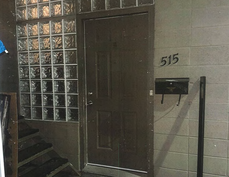 A door with privacy glass next to it.