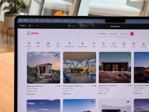 A computer screen with the Airbnb website displayed.