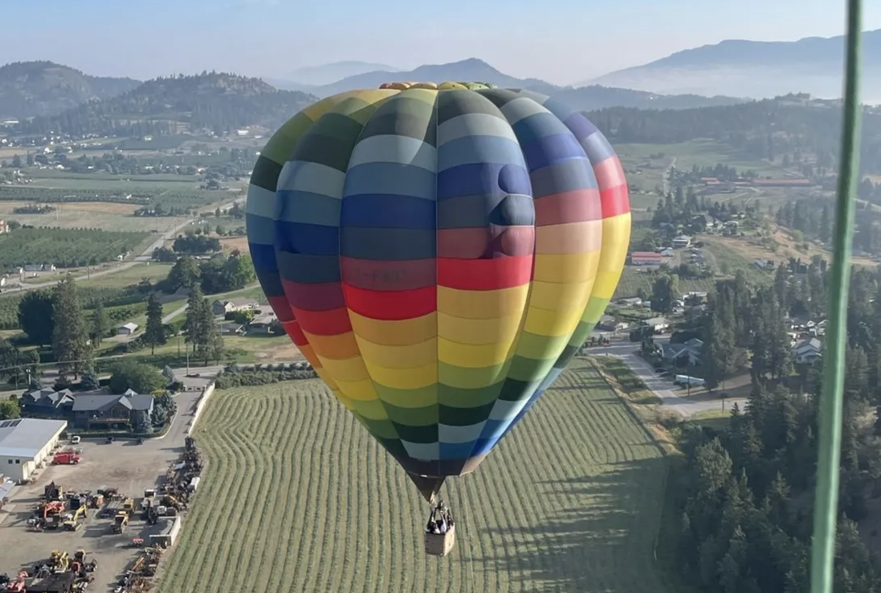 A hot air balloon flying in the Okanagan.