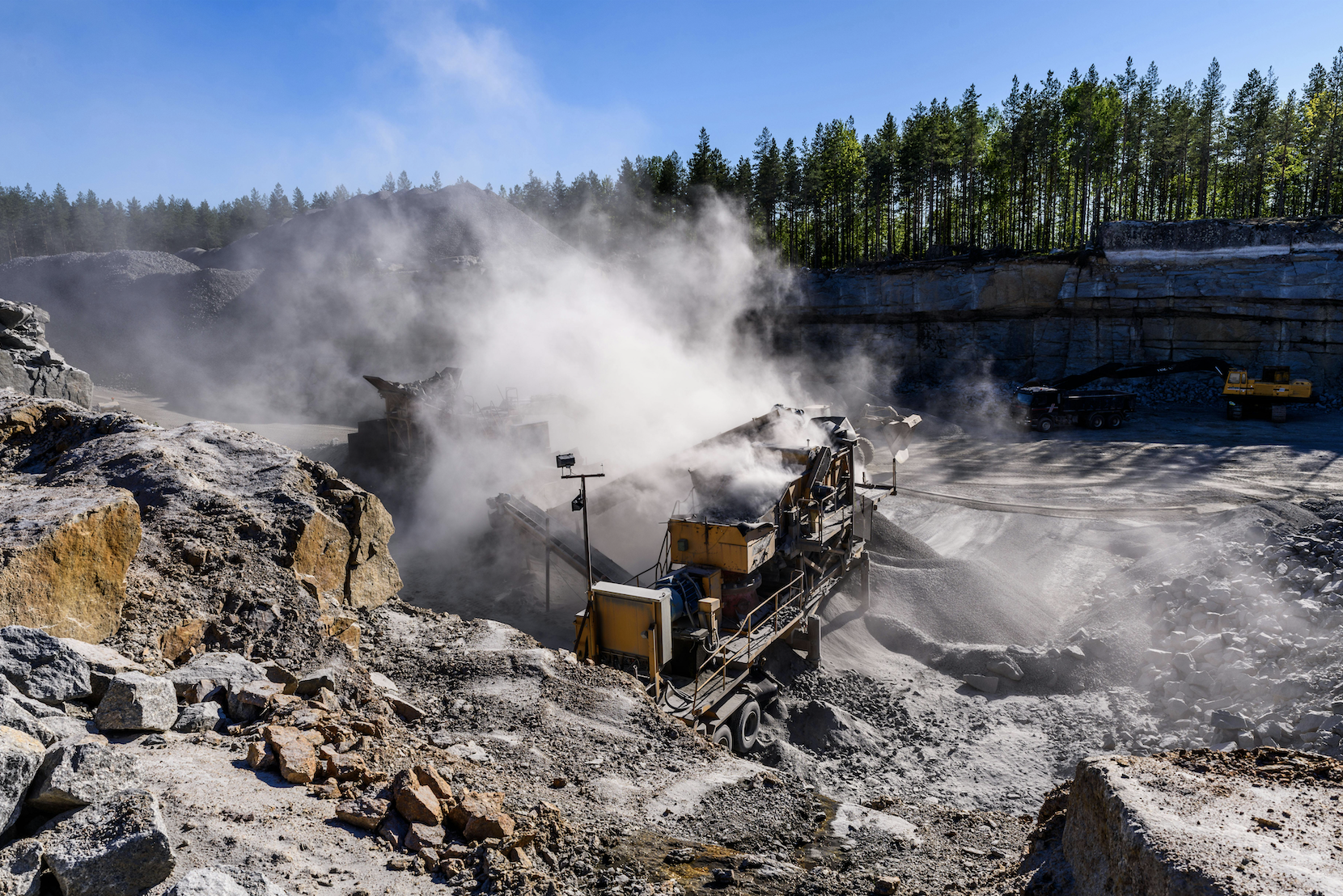 Machinery working in a gravel pit.
