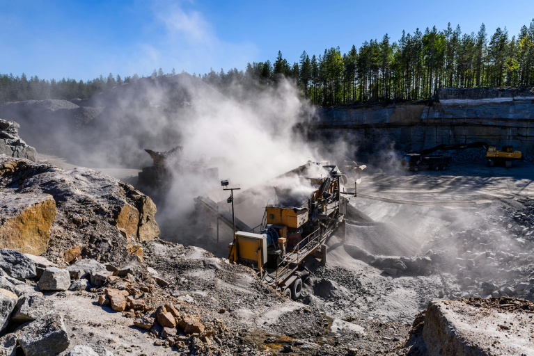 Machinery working in a gravel pit.