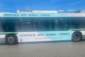 A pro-choice message on the side of a transit bus.