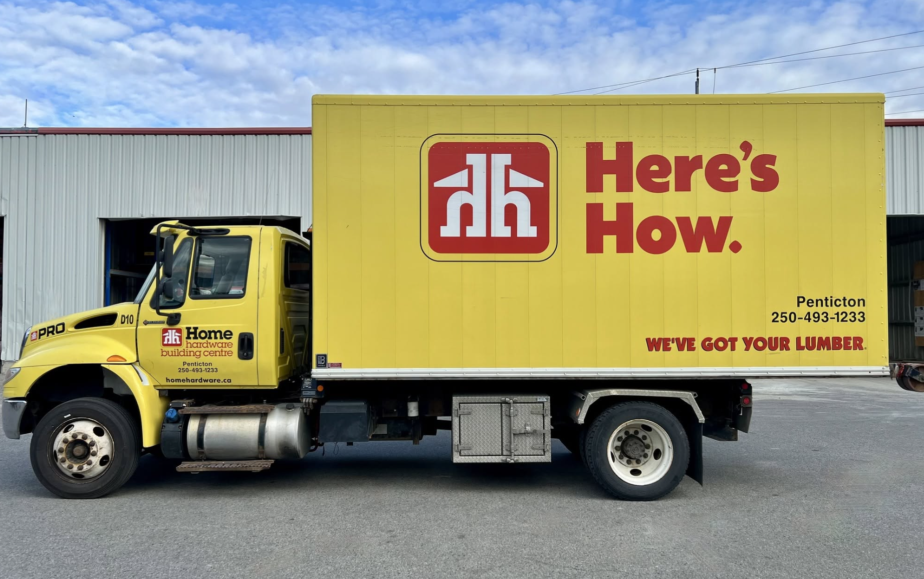 A yellow home hardware truck