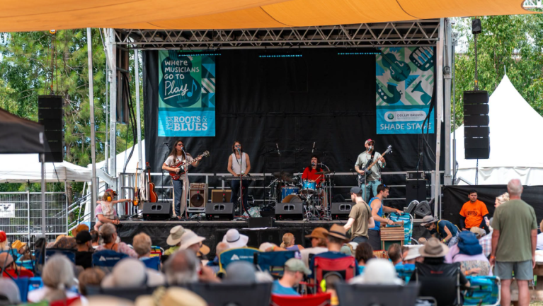 A band play on stages at the salmon arm roots and blues festival