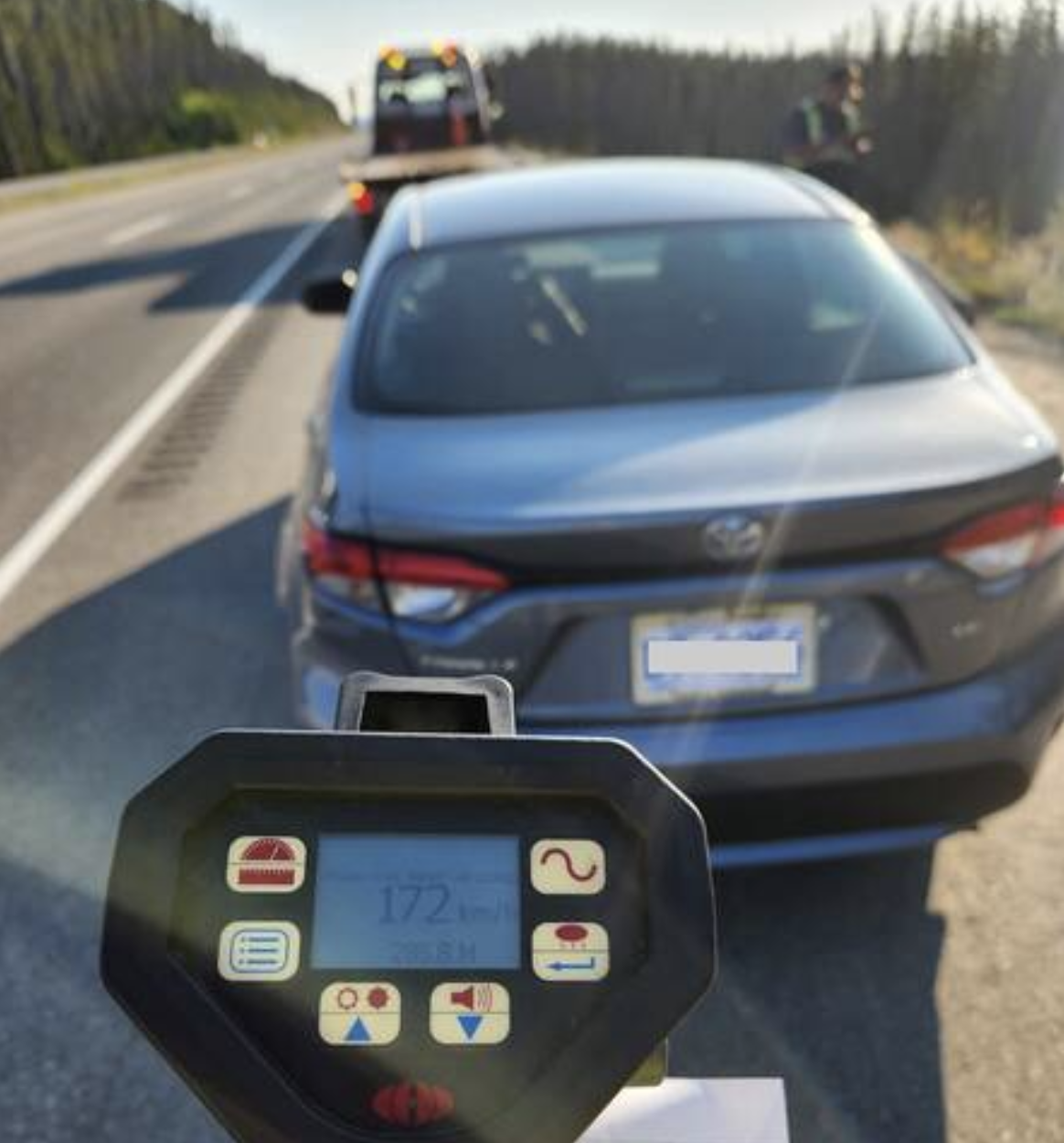 a police radar clocks a toyota speeding