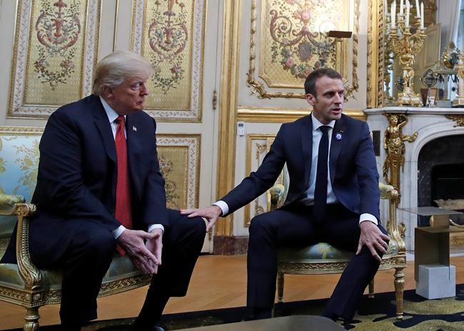 Tapping Trump's thigh, Macron seeks to defuse tensions | iNFOnews.ca