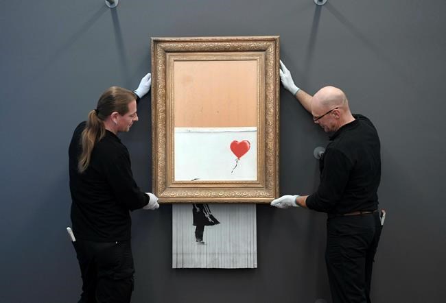 Banksy painting that self-destructed displayed in Germany | iNFOnews.ca Banksy painting that self-destructed displayed in Germany | iNFOnews.ca
