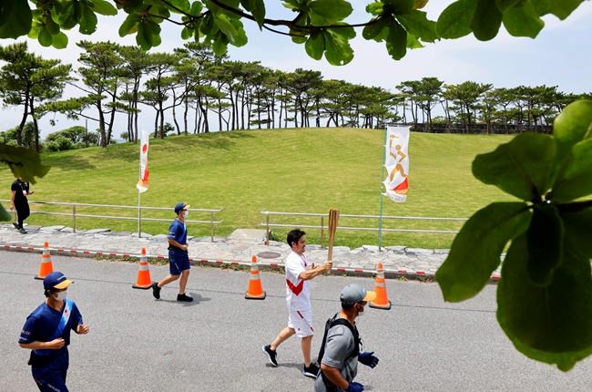 Olympic torch relay detour; diving test event opens in Tokyo | iNFOnews.ca CP287360190