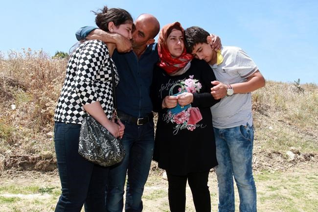 Migrant rescue at sea unites 1 family, breaks up another | iNFOnews.ca Migrant rescue at sea unites 1 family, breaks up another | iNFOnews.ca