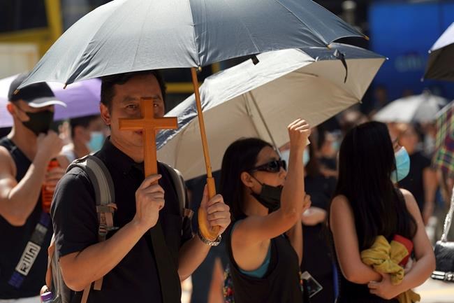 The Latest: HK protesters wear masks before ban takes effect | iNFOnews.ca The Latest: HK protesters wear masks before ban takes effect | iNFOnews.ca