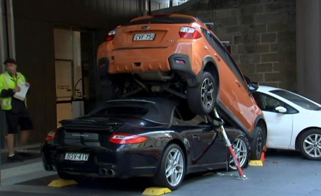 Hotel valet has lucky escape, but Porsche gets crunched | iNFOnews.ca CP581213066