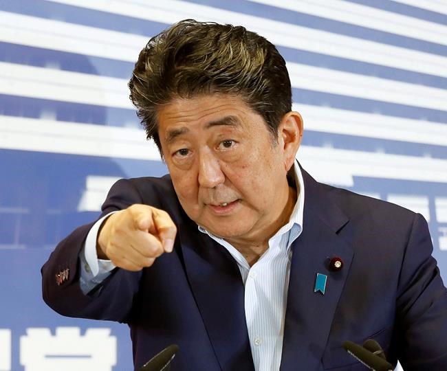 Japan's Abe pushes charter change despite election results | iNFOnews.ca