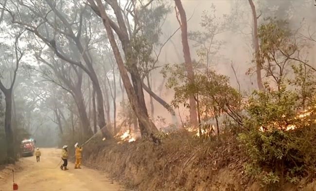 Wildfire-ravaged areas of Australia get holiday relief | iNFOnews.ca Wildfire-ravaged areas of Australia get holiday relief | iNFOnews.ca
