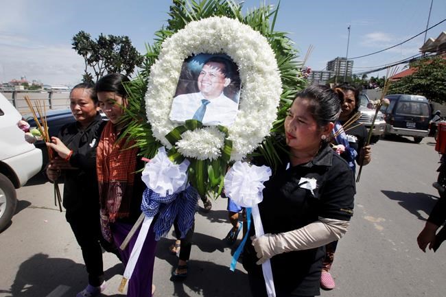 Wife of alleged Cambodian killer 'shocked' by accusations | iNFOnews.ca