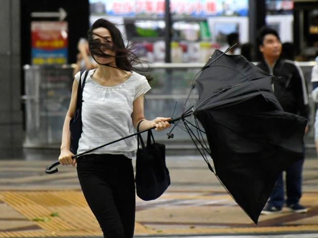 Strong typhoon slams western Japan; 2 dead, airport flooded | iNFOnews.ca Strong typhoon slams western Japan; 2 dead, airport flooded | iNFOnews.ca