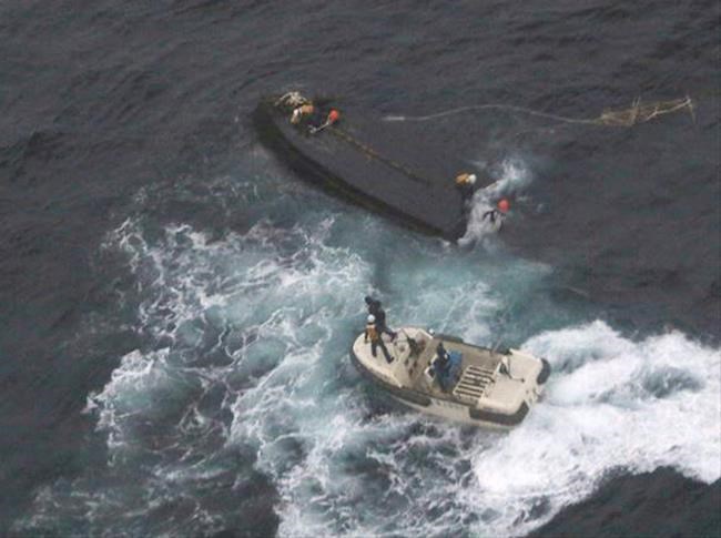 Japan sends home 3 N. Koreans rescued from capsized boat | iNFOnews.ca Japan sends home 3 N. Koreans rescued from capsized boat | iNFOnews.ca