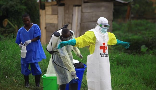 Battles over safe Ebola burials complicate work in Congo | iNFOnews.ca