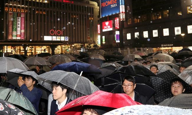 Japan votes for lower house; Abe's party seen headed for win | iNFOnews.ca CP1136112541